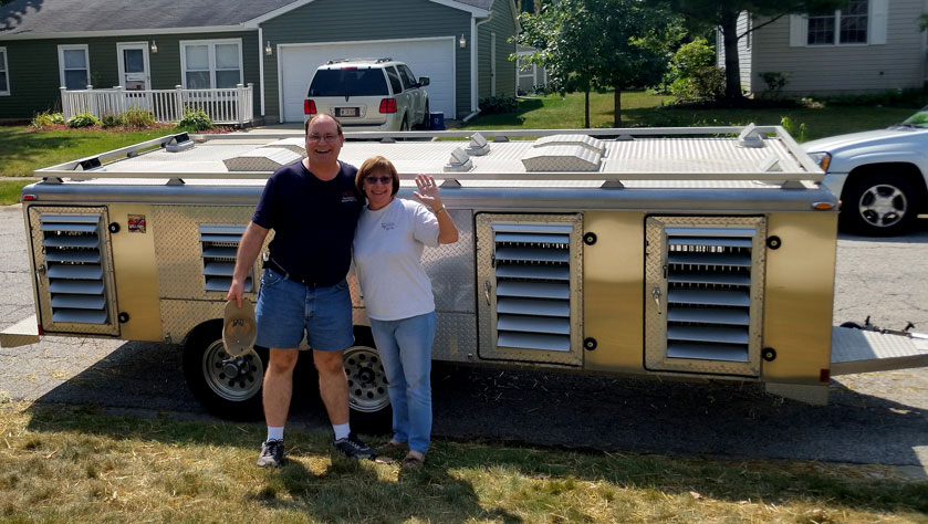 Gavin & Gaye in front of the Dog Hauler